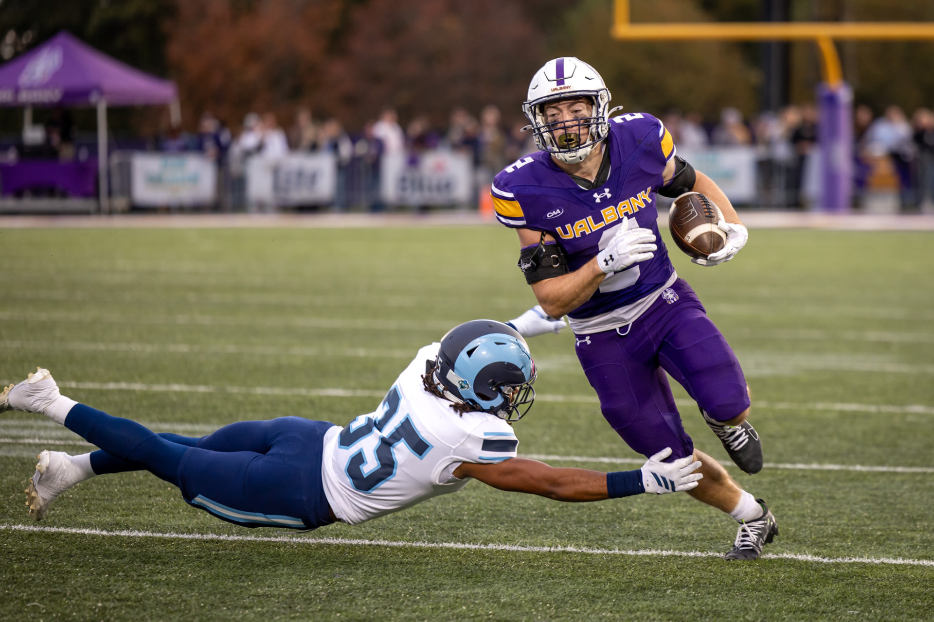 Carrying the ball during a UAlbany football game